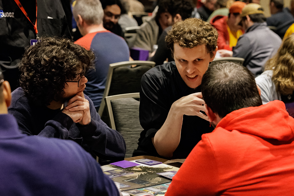 Brandon listens to a player at the Hunter Burton Memorial Open in 2023. Photo © John Brian McCarthy