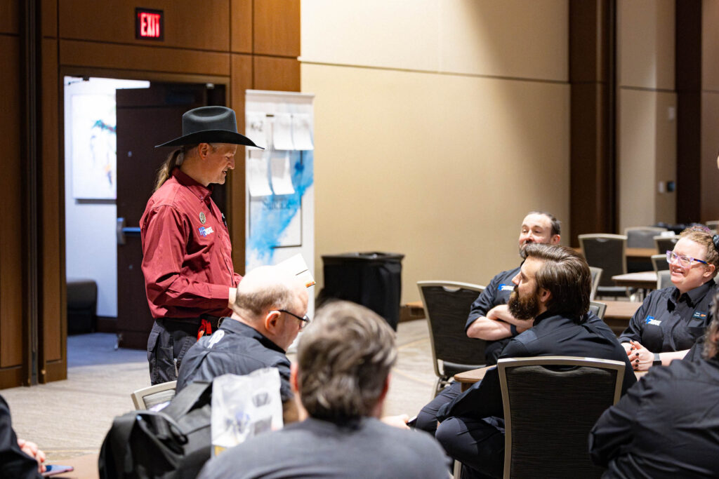 David hosts a judge meeting at the Hunter Burton Memorial Open in 2024. Photo © John Brian McCarthy