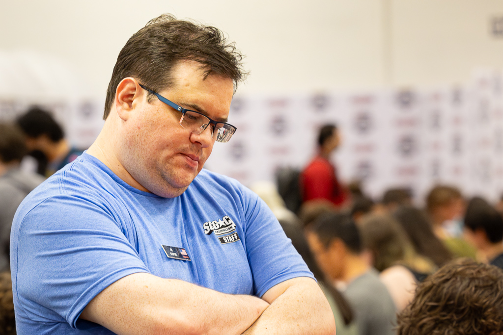 Joe watches a match at the Regional Championship at SCGCon DC in 2024. Photo © John Brian McCarthy