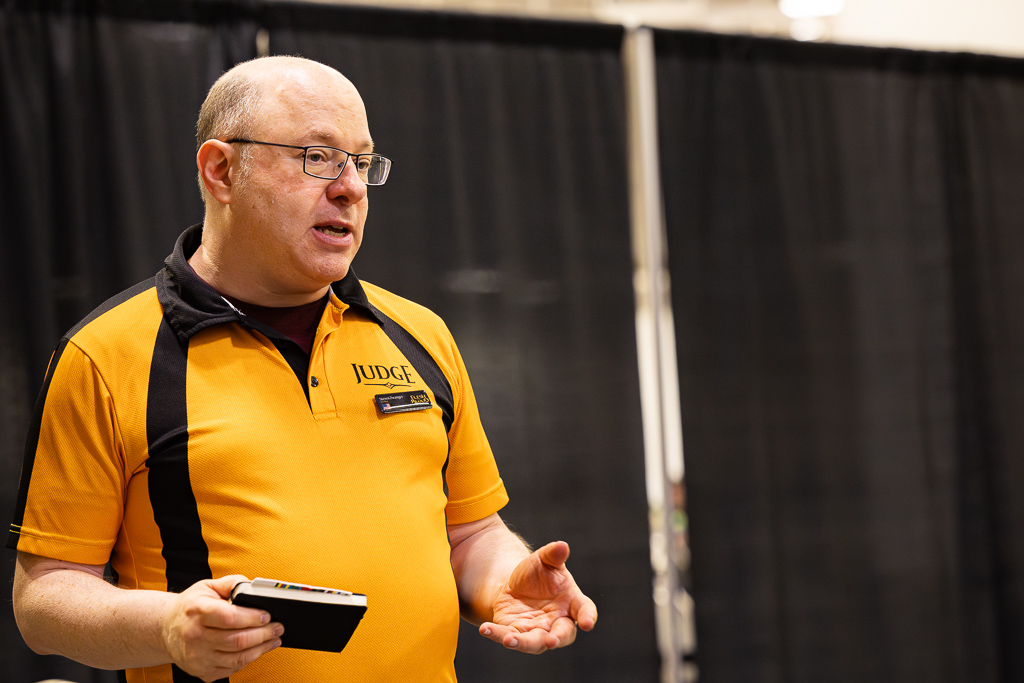 Steven debriefs judges at Nationals in 2024. Photo © John Brian McCarthy